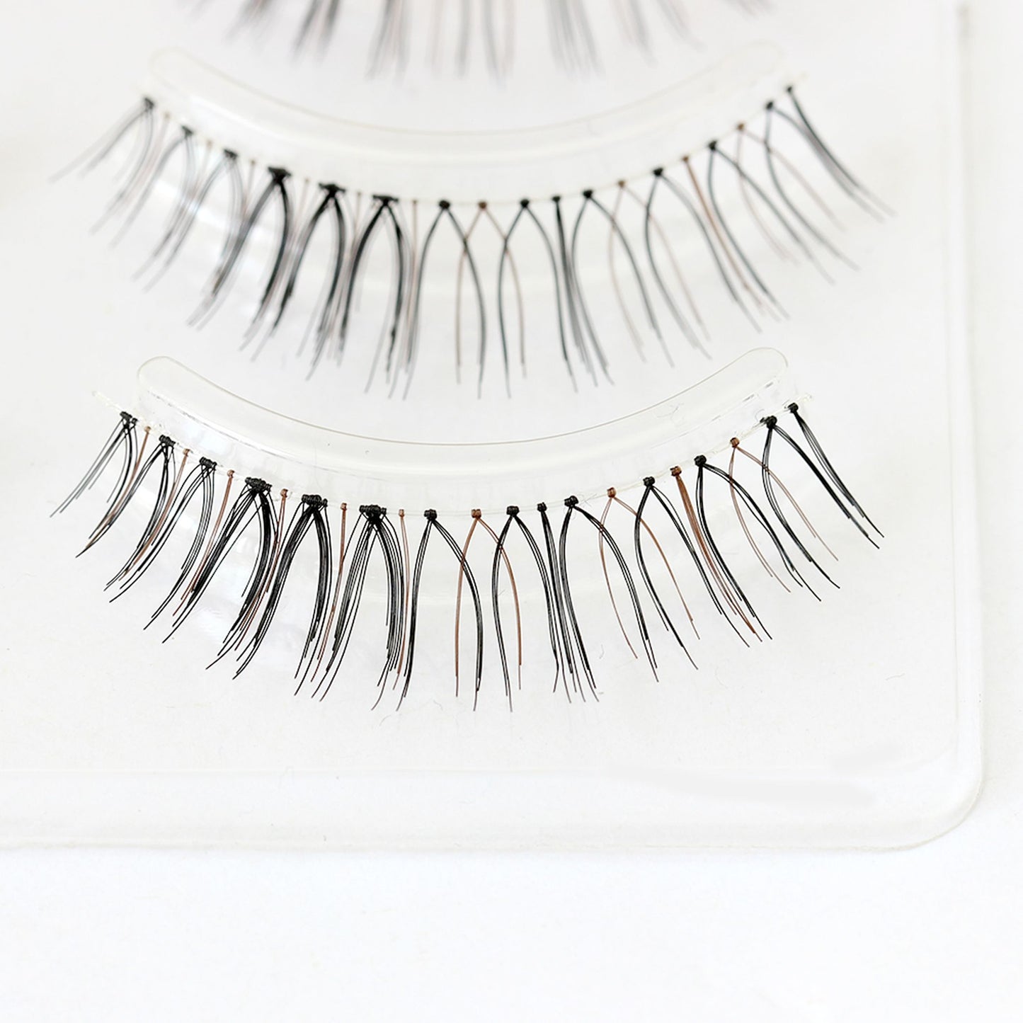Women E5 Light fluttery mini False Lashes Black and Brown Wispy attention-grabbing look lashes 4 lashes Pack